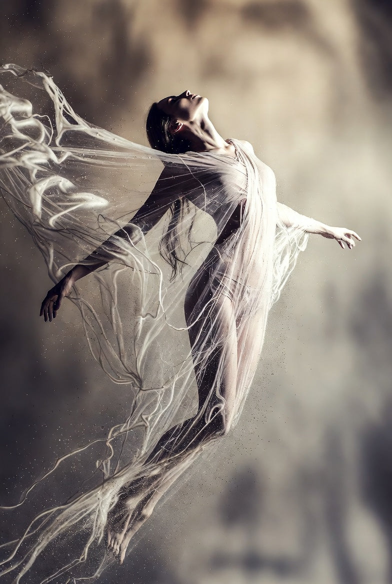Dancer with flowing fabric against a blurred background