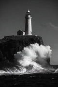 Lighthouse on a rocky outcrop with large waves crashing around it.